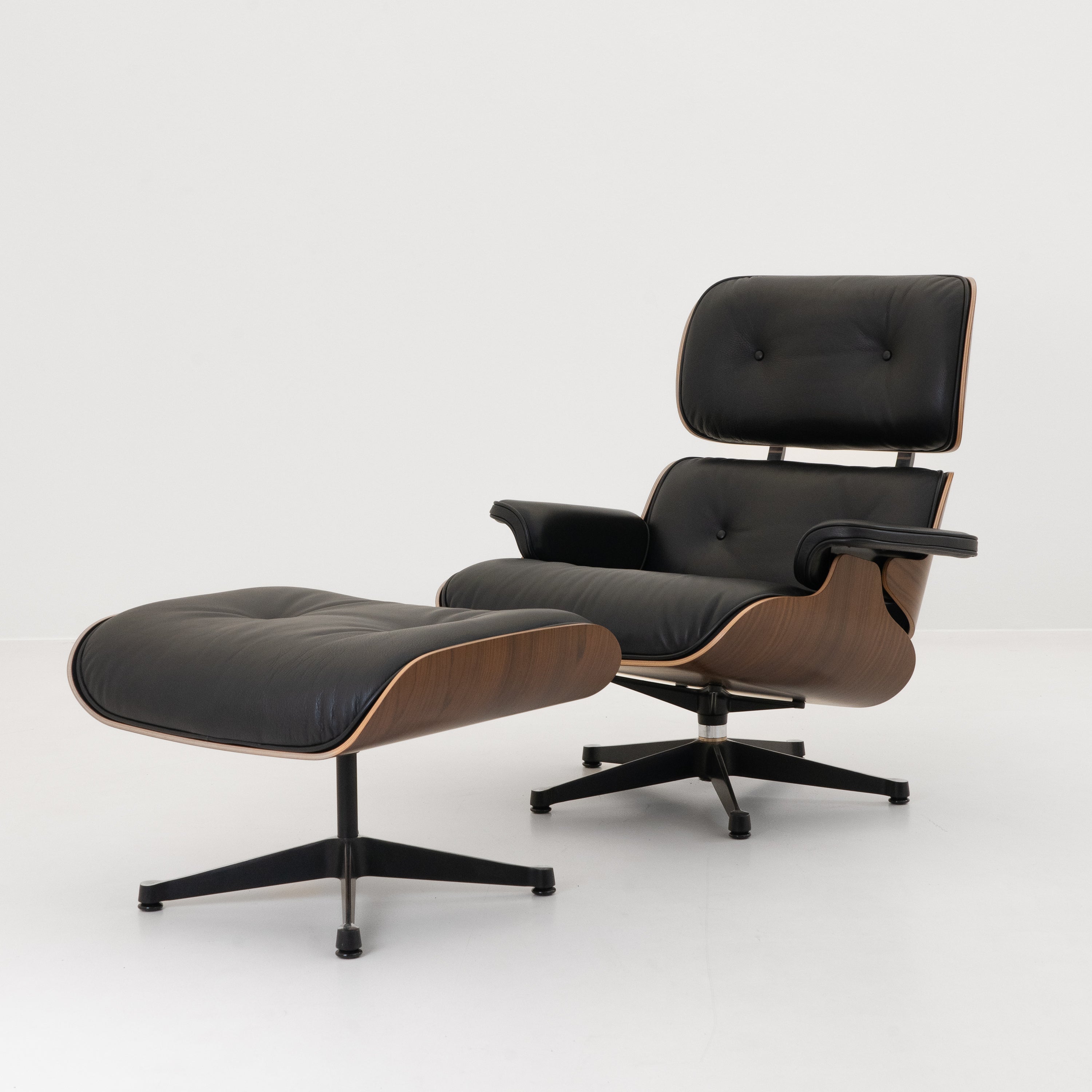 EamesLoungeChairmitOttoman-Vitra-Neu-Holz-Palisander-Leder-Schwarz-01.jpg